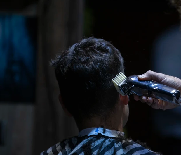 Close-up of clipper work during a barber haircut